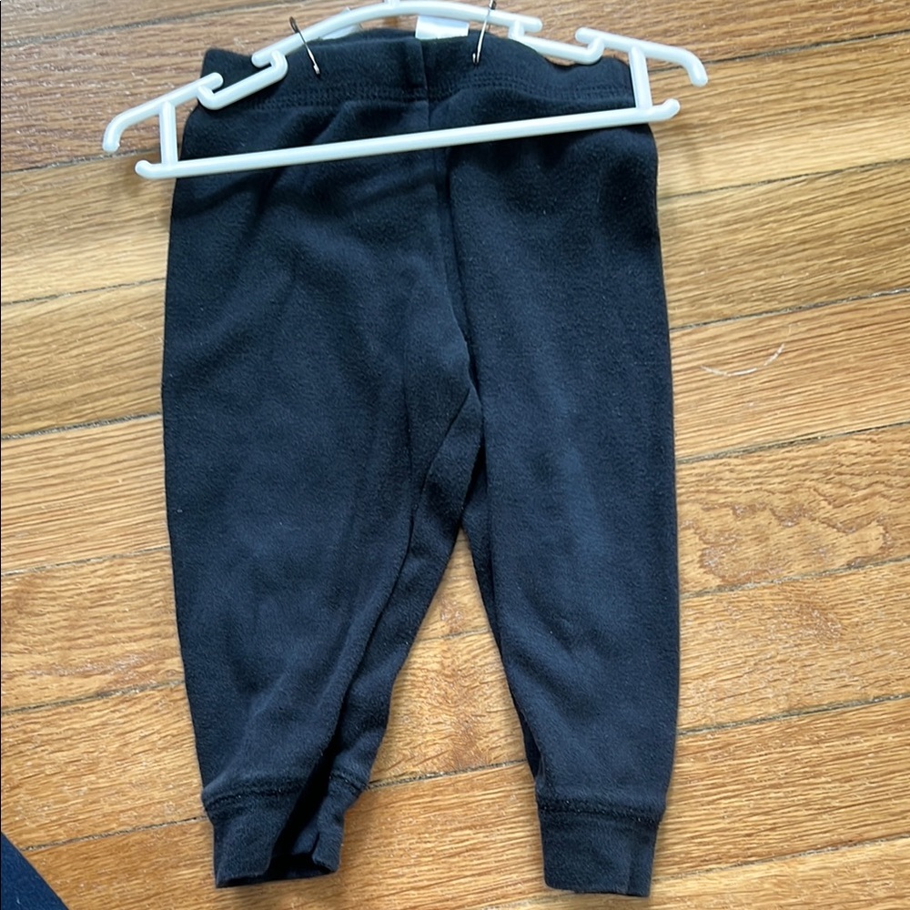 3 for $9 
Good condition Carters black fitted pants, size 12M